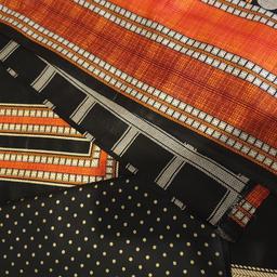 3 piece unstiched ladies cotton suit,  black and orange colour, printed front and back