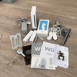 Nintendo Wii console and accessories. Everything is in really good condition. There’s a slight scratch on the front of the console (see picture). Comes with everything you see in the pictures!