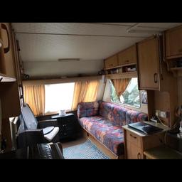We used for my mom, she living in the caravan! 
Currently we use as storage. Good condition!
Kitchen, ( gas and electric ) we have 3 gas canister) toilet , bathroom, wardrobe lot storage , 
Only one Bed! Because we converted! 
Heating with electric fireplace and gas fireplace also .
Bathroom all works comes on wheels 
Carpeted all the way inside .