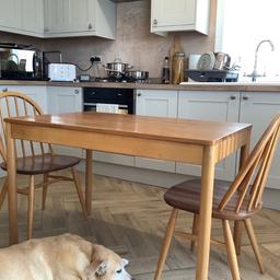 Lovely genuine Ercol blonde mid century breakfast table and 2 Windsor chairs. Table dimensions 107cm W x 69cm D. In good, sturdy used condition.

Collection only from Huddersfield.
