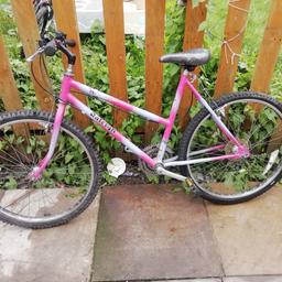 Girls rally mountain bike in use condition 1.8.5 Inc frame 26inc wheels all gears n breaks work perfect gud bike. No longer needed 30 ono collection only