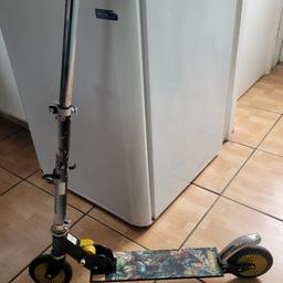 scooter age 5+. can be adjusted .