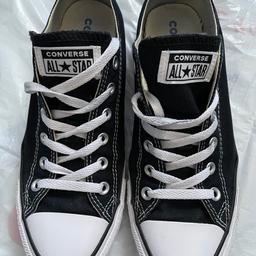 Classic black and white unisex Converse low-top trainers in excellent almost new condition. Worn once. Men’s size 8; women’s size 10.