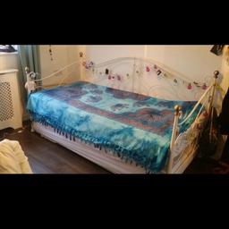 White single bed with trundle plus two mattresses great condition. Collection only please.