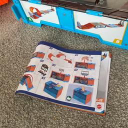 Hot wheels track builder . Can be set up to 3 different tracks. Comes with instructions. Folds all back into a box