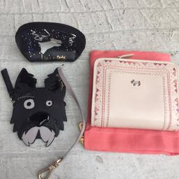 3 Radley purses the large dog one is brand new the coin purse used a couple of times the other one has been used  so a few signs of wear but still in good condition