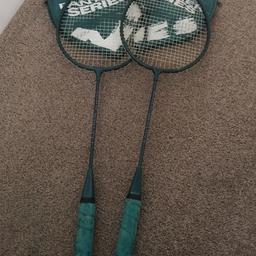 Slazenger badminton rackets with green head covers