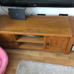 Solid wood tv stand, can do with a sanding down and polish
Measurements 
Width 52.5 inch x height 19inch x depth 17.5 inch