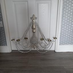 Pretty wall sconces takes tealight candles. Silver with diamontes I have 3 of these. Collection only please. £10 each.