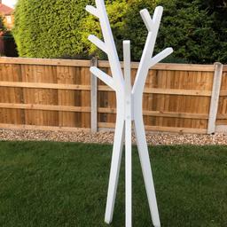 Very modern coat stand in white gloss. Immaculate condition.