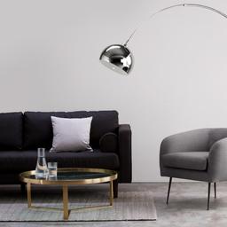 Large Arc Overreach Floor Lamp, Chrome and White Marble. 
https://www.made.com/ppc/bow-large-arc-overreach-floor-lamp-chrome-and-white-marble-125
It is bigger and heavier than you'd expect, make sure you have space for it in your reception room. 
Collection only, from the 2nd floor.