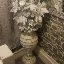 a big bling vase with flowers £30