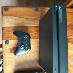 xbox one x in very good condition, it has 2 controllers with a rechargeable battery plus charger n leads 12 games . Neil 07774002749 cash on collection please