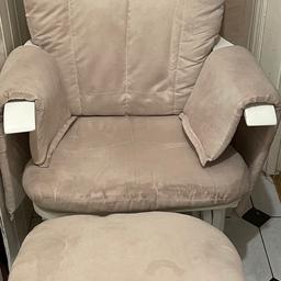 Comfy rocking chair and footstool. The chair reclines and it has storage pockets at the side. 
Good used condition- has some water marks but easily cleaned. Collection B24 Erdington