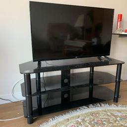 BLACK GLASS AND CHROME TV TABLE, EXCELLENT CONDITION
COULD DELIVER LOCALLY FOR PETROL COST