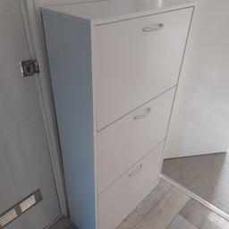 White 3 drawer shoe cabinet. Can hold up to 18 pairs of shoes. 

Good condition 

Length- 120cm 
Width- 60cm
Depth - 25cm