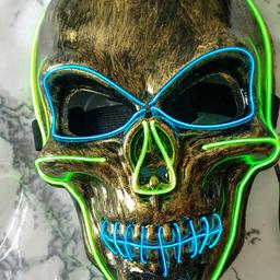 selling brand new masks has coloured light that flashes elasticated strip at the back to secure.. masks require  2 AA batteries not included but  can show them working  I have 2 of This design for sale

collection Hallwood Park wa7 2fr