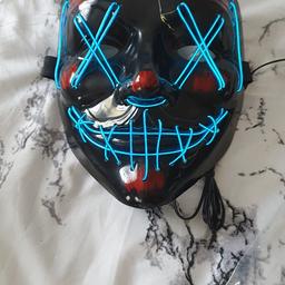 selling brand new masks has coloured light that flashes elasticated strip at the back to secure.. masks require  2 AA batteries not included but  can show them working  collection Hallwood park wa72fr