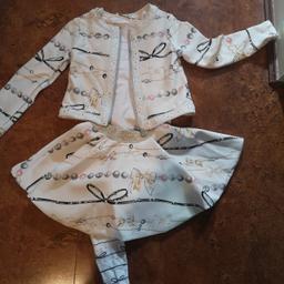 Jacket, skirt, top and matching tights age 4 years old. Good condition from a pet and smoke free home