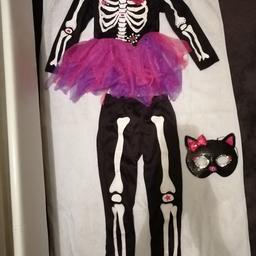 Girls skeleton top, pants and cat mask age 4-5 years.