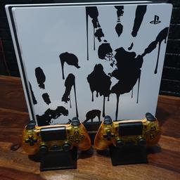 limited edition death stranding ps4 pro comes with death stranding steal book game
and 2 official death stranding controllers and dual charging/cooler dock also power lead and hdmi cable

controller alone sell on ebay for £80 - £120

Collection only