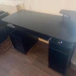 Black desk with storage
Includes 2 drawers & pull out laptop sliding table

(Sliding laptop table is missing a screw & also as shown in pic there desk table has a chip near to the rear end)
Width 120
Height 75
Depth 56
Available to collect

Sensible offers are welcome