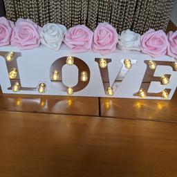 I have had my special day, so am now selling my home made centre pieces and wedding decorations.

Battery operated "love" signs with flowers attached.
I have 3  slightly different, 1 has more pink flowers. They are only stuck on with glue so may need a little more glue dabbed on, or can be taken off to re arrange the design.
 I would like £5 each