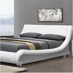 Italian designer curved frame Faux white leather some wear and tear selling due to arrival of new bed looks nice adds a touch of style to any bedroom….