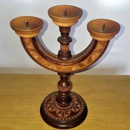 Beautifully carved three branch candle holder.
Measures 8" tall x 6½" W top x 4" diameter base.
In excellent condition

Please take a look at my other items for sale.