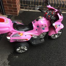 pink motorbike ride on - makes an engine noise and plays music. works perfectly. power charger included. front plate missing as shown in picture but this is purely cosmetic and doesn’t affect the function of the toy at all x