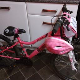 girls apollo RECALL bike with helmet like brand new need air in tyres of bein stood and not used age 8 to 12 collection only