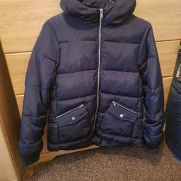 Very nice coat and in excellent condition.
Size 13 yrs