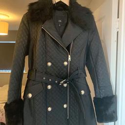 Bought from river island cost £90 new
Worn once for less than an hour.
Size 10
Perfect for winter
Beautiful soft fur on sleeves 

Happy for collection or payment through PayPal or secure