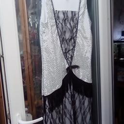 flapper dress size large (14-16)
beaded bag silk gloves
beads
cigarette holder ( pretend)
worn once
no offers accepted
collection within 3 days
can post