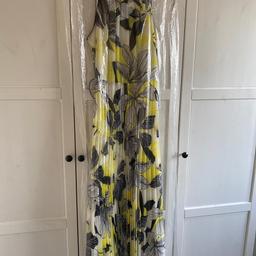 Gorgeous black and lemon long dress from Roman Originals, it is pleated, very long and flowing. I brought it and never wore it. It is now too big. 
Size 16
Collection Ws9
