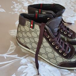 genuine gucci trainers in good used condition. leather upper. size 6.5.
