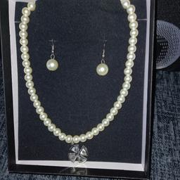 Pearl necklace and earrings for pieced ears comes in a box brand new never been out of box great for a present collection only
