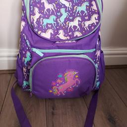 A purple colour Smiggle rucksack. It has a unicorn design on it and has plenty of pockets to put everything in. All the zips are working fine on it £5.00 collection from LU4 area.