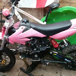 125cc pit bike great condition with key all original parts very little use good clean bike Manuel with clutch 4 stroke engine pulls well  brakes work fine. bike rides fine .looking for trades for road bike or sensible offers 
