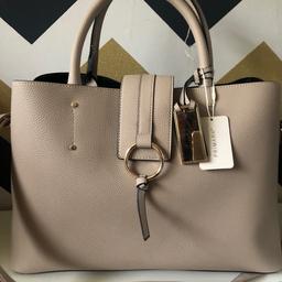 Beige colour bag brand new very spacious 3 compartment one with zip cones with big strap