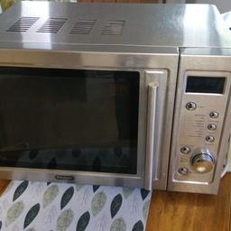 Excellent clean condition, fully working. Interior is also stainless so no peeling or rusting. Comes with glass plate. 18" wide. Preset programmes. Grill/combi and auto cook feature.