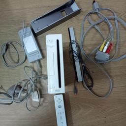 Nintendo Wii console. Complete with everything in picture. Console, all wires, sensor bar, controller. Test before you buy. No time wasters. Collection from TW5 9BN