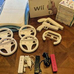 Wii game console with lots of accessories and games. lots of family fun for kid

1x console (with box plus all wires needed)
1x Wii fit board (with carry case)
5x steering wheel (3 of which are Nintendo originals)
2x guns 
3x controllers 
2x nun chucks (needed for games)
lots and lots of games 

Wii play
Wii fit
Wii fit plus 
Wii sports 
Puzzle quest
Zelda Twilight Princess 
Wario ware smooth moves
Mario kart
Red steel
Shaun White snowboarding
Just dance (5 of them)
Dance on Broadway 
Fruit fall