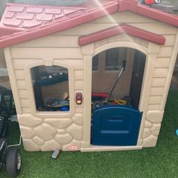 Children’s playhouse with picnic area and stools (table removed) as taking apart to sell but included with two chairs.