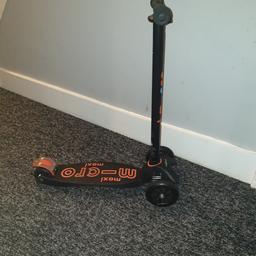 Micro maxi scooter, black and orange. Height adjustable handle bar. Pretty good condition, wheels run smooth. Not used much as son preferred a stunt scooter.
From smoke and pet free home.
Collection from walthamstow. 
Thanks.