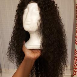 Caribbean Spring Curls Human Hair Wig.
Black
22 inches
Can be curled, washed, dyed or bleached. 
Soft curly hair. The hair is best maintained when damp by using a wide tooth comb. 
The hair can be styled as wet curls (by using water or conditioner in a spray bottle).
