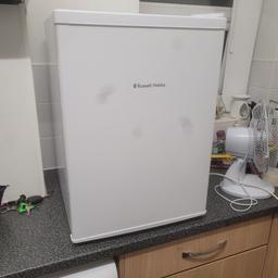 Russel Hobbs small fridge, 17.5 " x 24.5" high x 20" deep. Nice clean condition, works perfectly. has a small dent at the back corner, pictured. obviously not noticeable if under a counter. ideal cor a camper, caravan, or worktop. fridge is about 8 months old, no longer needed by myself, no offers pls. collection only. marks on photo are from my camera. 