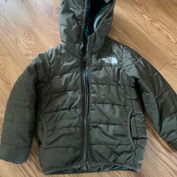 Infants North Face padded jacket size 3 years. Beautiful coat can be reversed to wear camo print. Really warm perfect for winter sadly outgrown. Good condition washes well.
