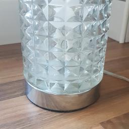 This is used but in great condition. Not only does this look great day or night, it is also a touch lamp so no fiddly switches. Perfect in any room of the home. Bulb included. Approx 6 inches high and 4 inches diameter