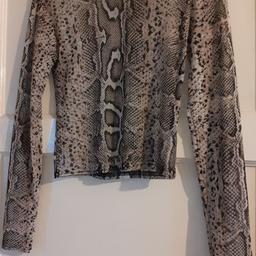 great condition 
size10
snakeskin patterns 
long sleeve 
new look